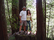 Dave and Heidi on a stump.