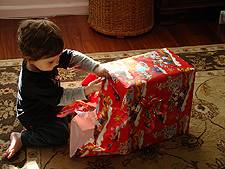 Ryder opening his present.