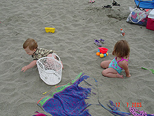 Jordan and Hunter playing in the sand.