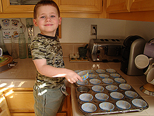 Hunter gets the pans ready.