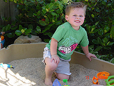 Hunter playing in his sand box.