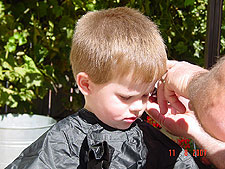 Hunter getting a haircut.