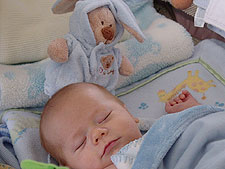 Napping with his new bear.