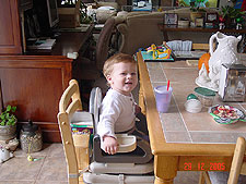 Hunter in his new booster seat.