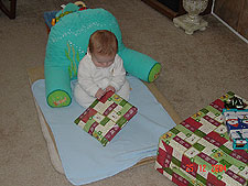 Hunter opening a present.