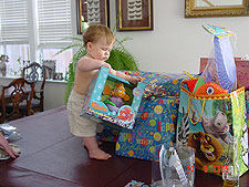 Hunter looks at his Finding Nemo bubble maker.