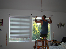 Dave installing the blinds.