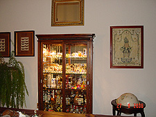 Cabinet holds our alcohol, barware, shot glasses, etc.