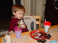Hunter eating chocolate cake
