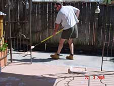 Dave painting the new cement.