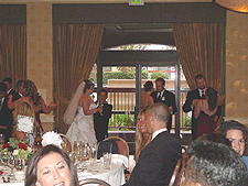 The bridal party dances...