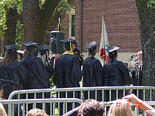 Ryan ready to receive his degree.  He is the one with the yellow tassle.