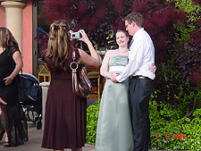 Doug and Jessica posing while Jennifer takes a picture.