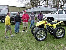 Dean, Peter, Schneider and others checking out the big tires on the quad!