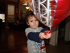 Ryder with mom's huge heart balloon
