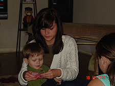 Hunter playing cards with the girls.