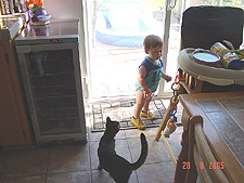 Hunter has already grown in to his cousin Tyler's work boots!