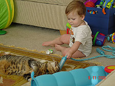 Hunter and Allie play with the jump rope.