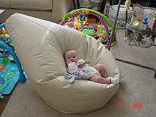 Hunter tries out the bean bag.