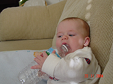 Hunter pretending to drink his bottled water...