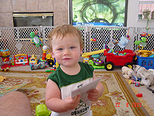 Hunter delivering the mail to daddy.