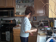 Heidi getting dinner ready.